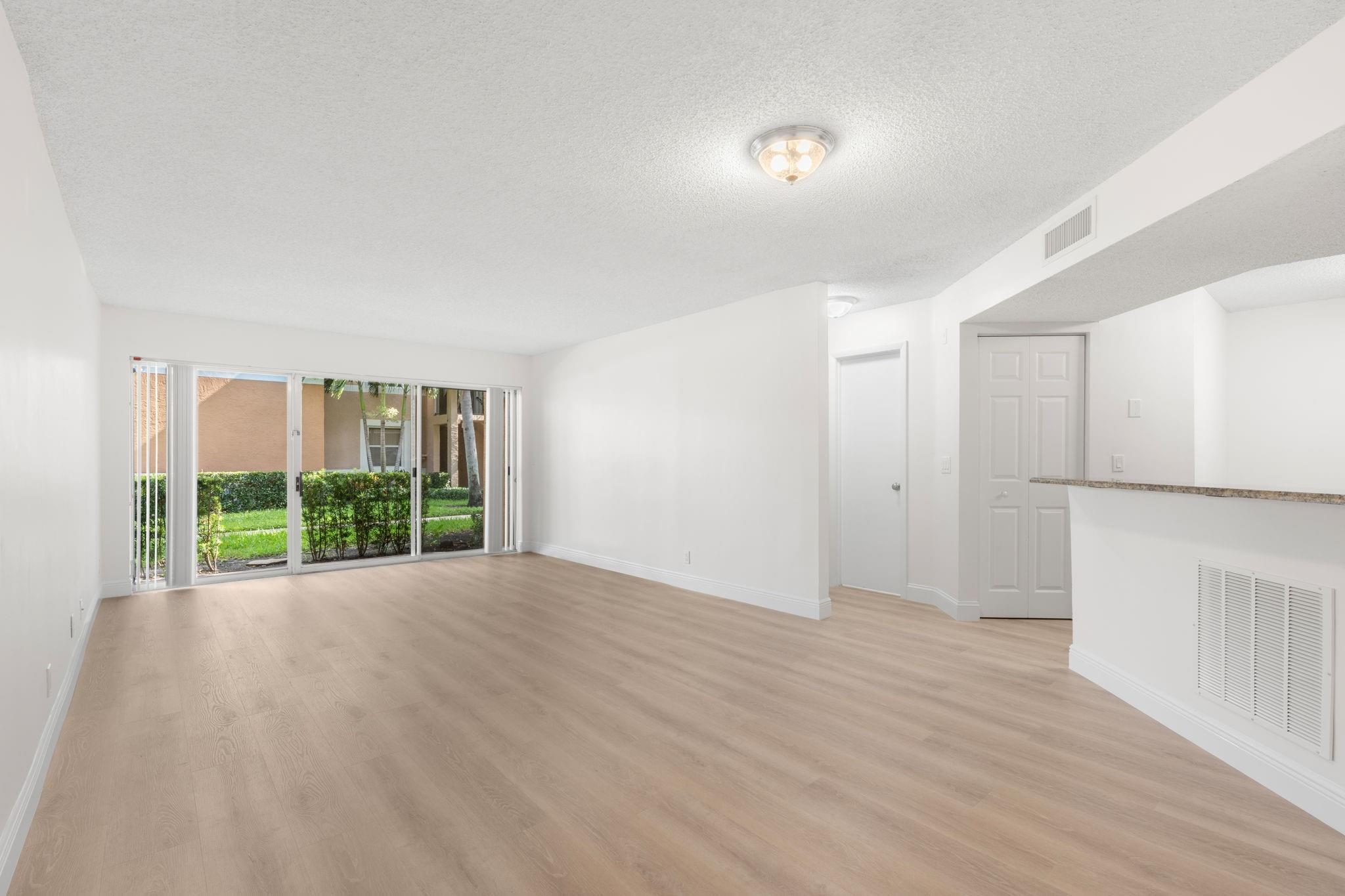 Bright and Spacious 2 bedroom 2 bathroom condo located in the gated community of Edgewater in the heart of Coral Springs. First floor unit just renovated! New Flooring, New Washer, Dryer, new vanities and new paint! Ready for its next tenant. This split floor plan offers comfort and a prime location minutes from schools, shopping, and dining. Community includes pool & hot tub, a children's pool, tennis courts, Child play area, two-story gym w/cardio & weight equipment, dog park, BBQ Area, & Clubhouse.