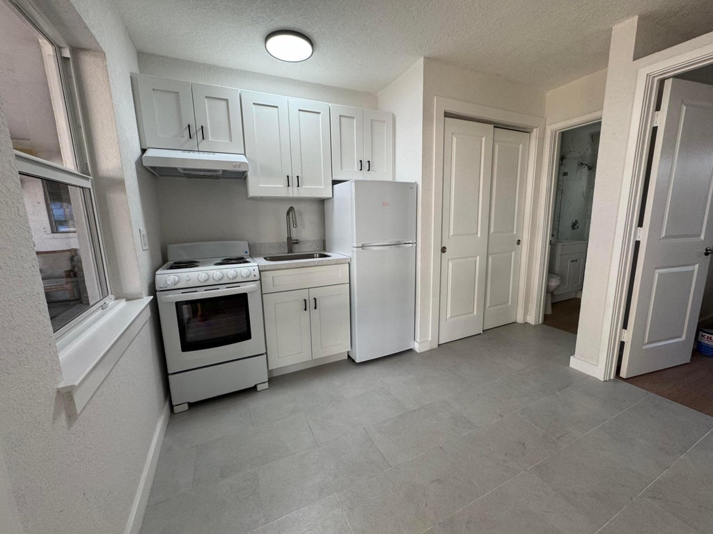 Photo of 110 Cascade Lane #2, West Palm Beach, FL 33404 (MLS # B26065002)