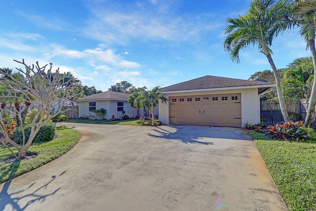 Photo of 5140 Laird Lane, Jupiter, FL 33458 (MLS # R11003804)