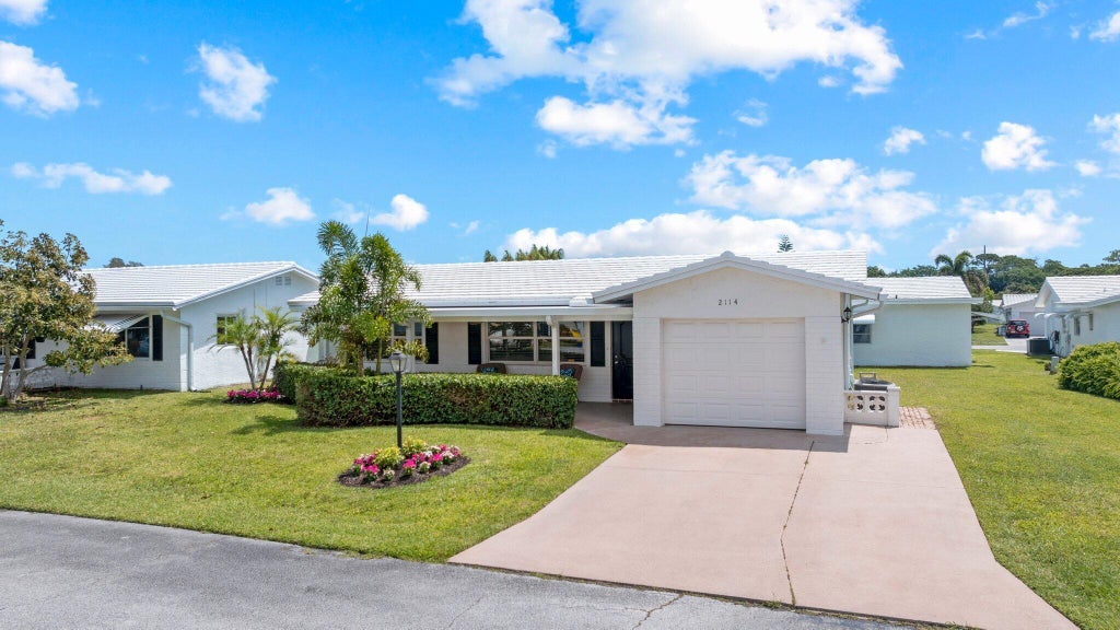 Photo of 2114 SW 13th Place, Boynton Beach, FL 33426 (MLS # B26080326)