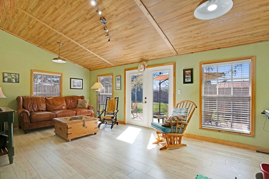 Fabulous opportunity to get an affordable clean move-in ready home at the end of a cul-de-sac and conveniently located to shopping restaurants and I-95. Large privately fenced backyard with storage shed and plenty of room for your toys, RV and boat. This 3/2 has a bedroom and full bath downstairs and large walk-in closet in the master. You'll have peace of mind and reduced insurance with impact glass and hurricane shutters. These owners have loved on this home for you with an updated AC inside and outside (1 year), and updated flooring (2 years) and a beautifully remodeled bathroom.