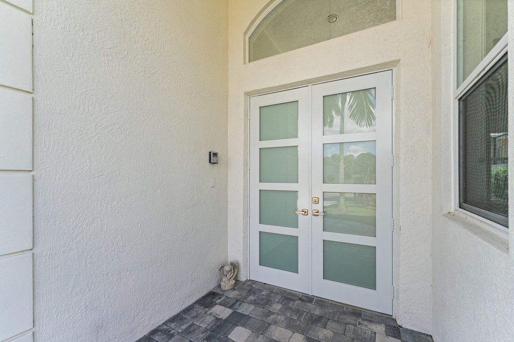 Photo of 128 Abondance Drive, Palm Beach Gardens, FL 33410 (MLS # B26012048)