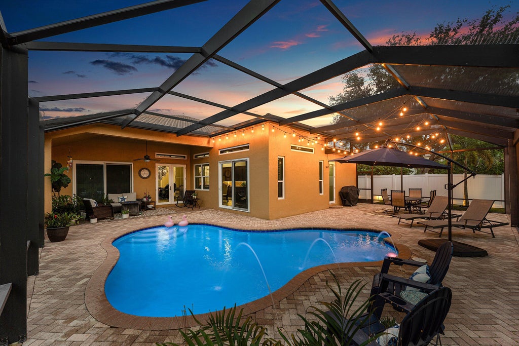 Photo of 1853 Palisades Drive, West Palm Beach, FL 33411 (MLS # B26048666)
