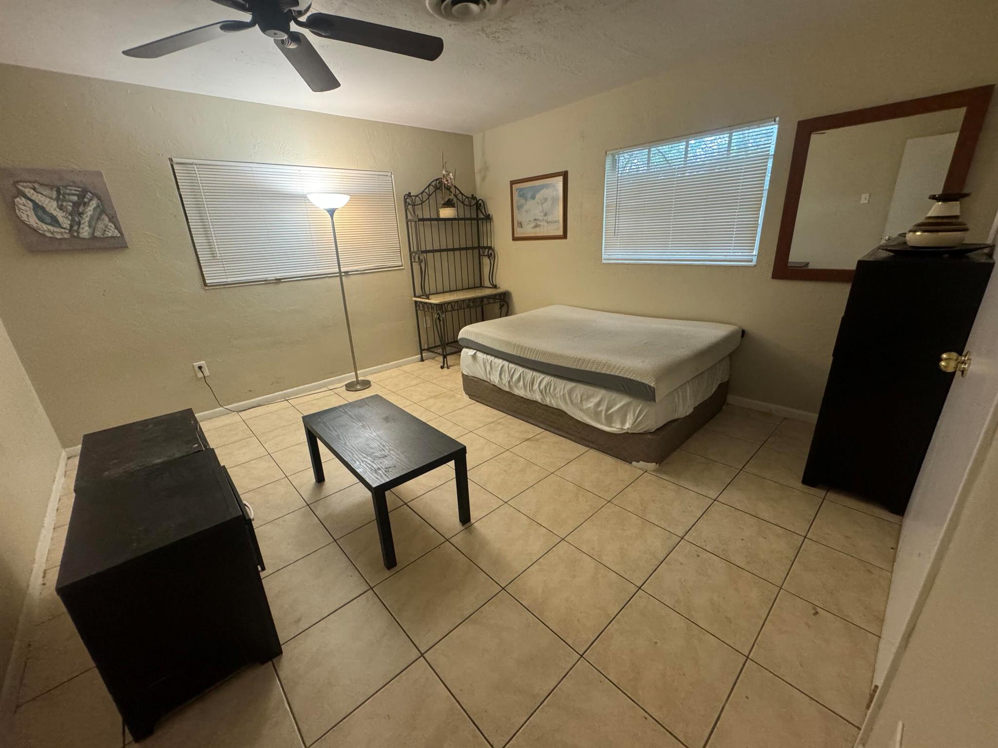 Welcome to this spacious 3-bedroom home located just minutes from downtown Boca, shopping, dining, and the beach. Featuring ample living space, this home offers an open layout, large windows with natural light, and a private yard perfect for relaxing or entertaining. Enjoy the convenience of a quiet residential neighborhood with easy access to I-95 and top-rated schools.Move-in ready and available now -- schedule your private showing today!