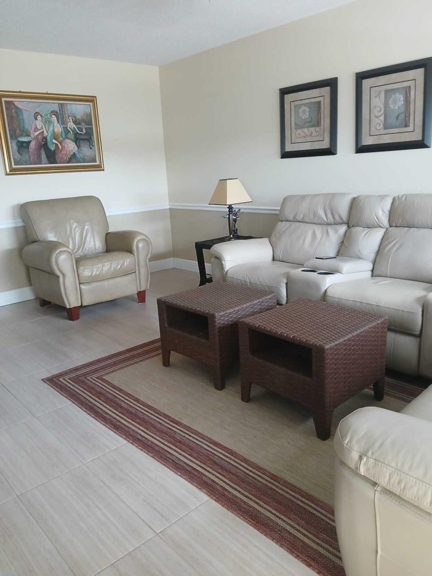 Top-floor 2-bedroom, 2-bath condo ready for its new owner's personal touch! Nestled in a quiet, well-maintained building, this bright and clean unit offers peaceful preserve views and plenty of natural light. The spacious living area and kitchen feature ceramic tile flooring, while both bedrooms are finished with comfortable vinyl flooring. A wonderful opportunity to customize and make it your own in a serene setting.