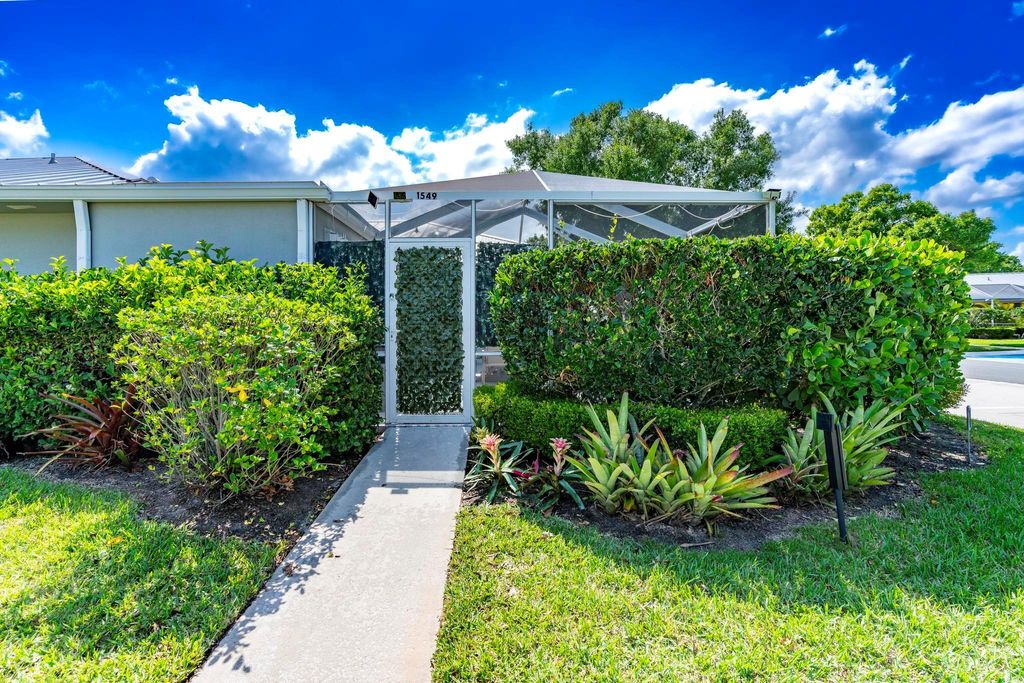 Photo of 1549 SW Waterfall Boulevard, Palm City, FL 34990 (MLS # R11086687)