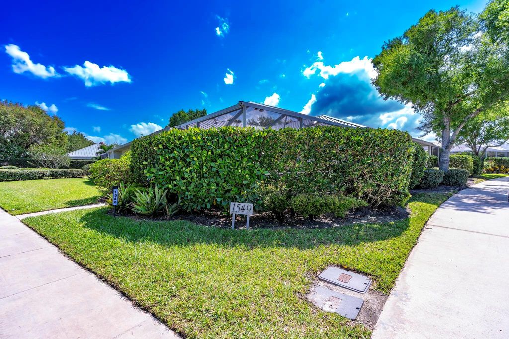 Photo of 1549 SW Waterfall Boulevard, Palm City, FL 34990 (MLS # R11086687)