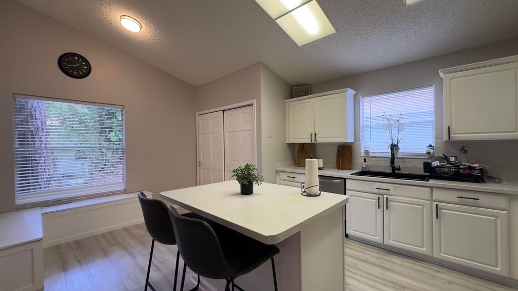 Photo of 320 Hammocks Trail, Greenacres, FL 33413 (MLS # R11021155)