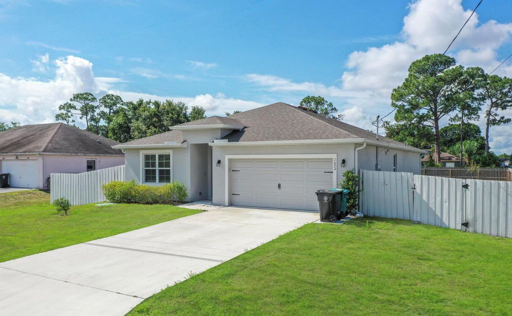 Photo of 1672 SW Bascom Avenue, Port Saint Lucie, FL 34953 (MLS # R11098439)