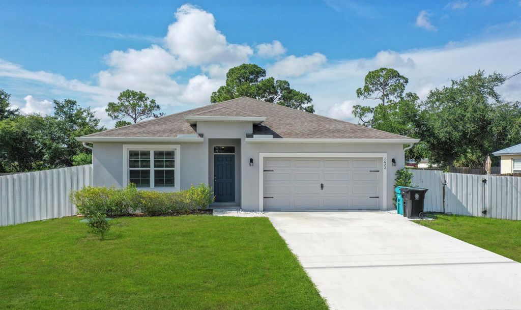 Photo of 1672 SW Bascom Avenue, Port Saint Lucie, FL 34953 (MLS # R11098439)