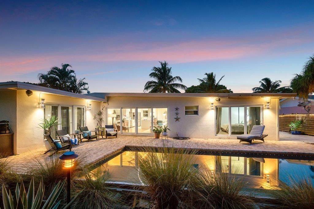 Photo of 622 W Ilex Drive, Lake Park, FL 33403 (MLS # R10728761)