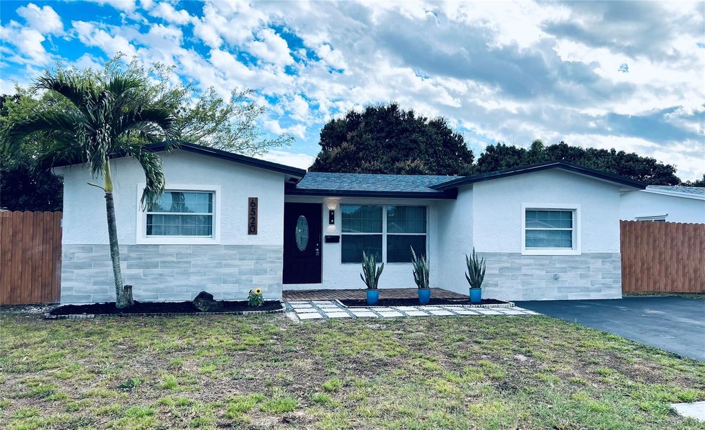 Photo of 6520 Kimberly Boulevard, North Lauderdale, FL 33068 (MLS # F10555654)