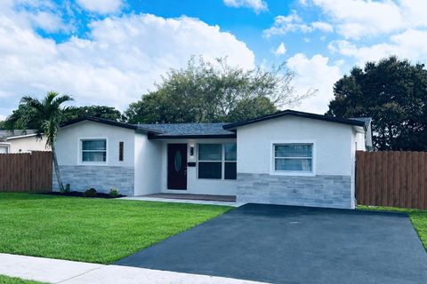 Photo of 6520 Kimberly Boulevard, North Lauderdale, FL 33068 (MLS # F10555654)