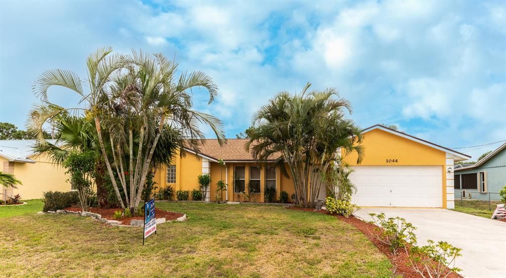 Photo of 1044 SW Romaine Lane, Port Saint Lucie, FL 34953 (MLS # R10711758)