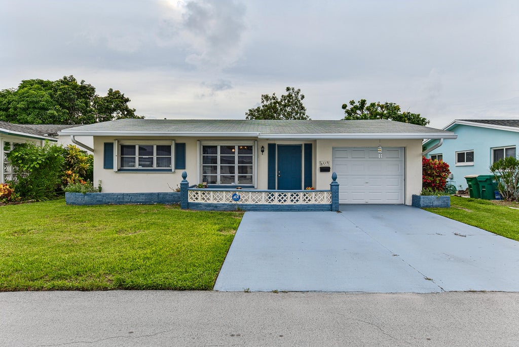Photo of 5717 NW 65TH Way, Tamarac, FL 33321 (MLS # B26080099)