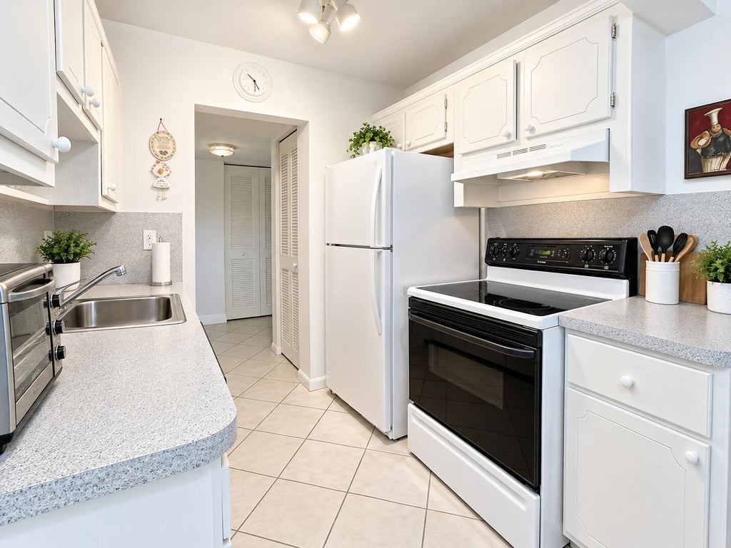 Photo of 5180 E Sabal Palm Boulevard #341, Tamarac, FL 33319 (MLS # B26093805)