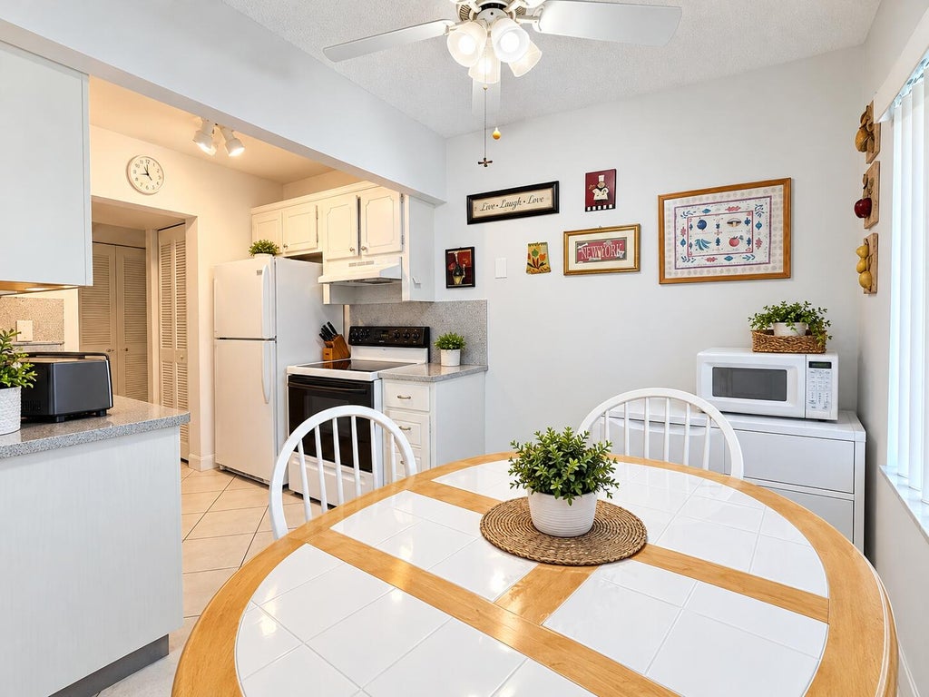 Photo of 5180 E Sabal Palm Boulevard #341, Tamarac, FL 33319 (MLS # B26093805)