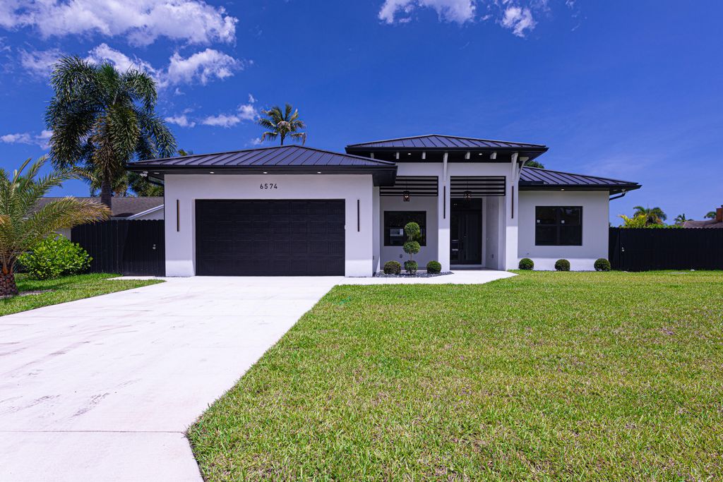 Photo of 6574 Rigger Road, Lake Worth, FL 33462 (MLS # B26024320)