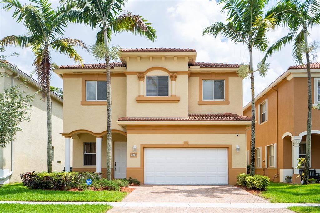 Photo of 212 Gazetta Way, West Palm Beach, FL 33413 (MLS # R10734115)
