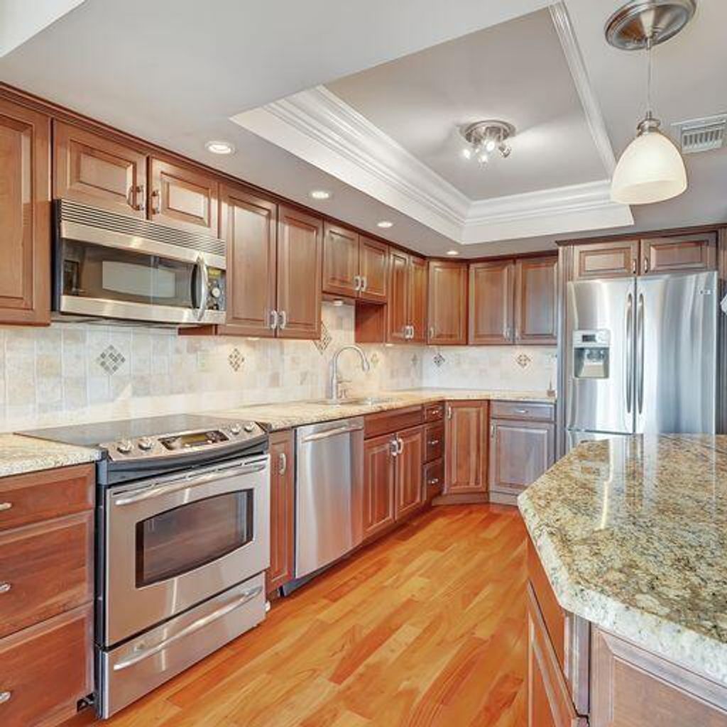 Photo of 5344 Woodland Lakes Drive #323, Palm Beach Gardens, FL 33418 (MLS # R10874019)