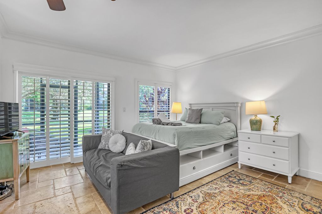 Photo of 11863 Wimbledon Circle #408, Wellington, FL 33414 (MLS # B26035204)