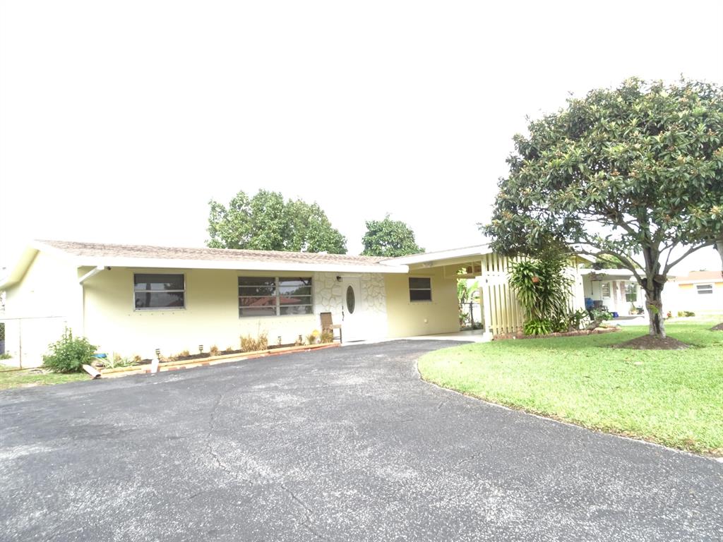 Wonderful Rental Property 3/2 Landry Room with washer/dryer. Large back yard and driveway, along with plenty of parking. Lawn care included in the rent. Centrally located near I-95, airport and downtown WPB and Lake Worth Beach.