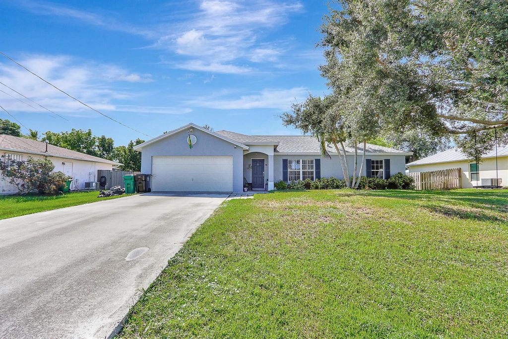 Photo of 2326 SW Woodridge Street, Port St Lucie, FL 34953 (MLS # R10922324)