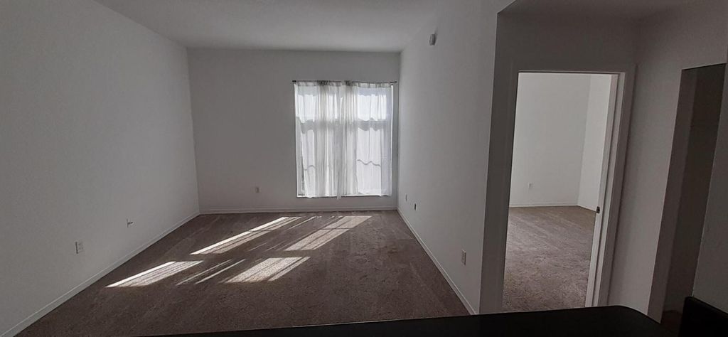 Photo of 1203 Town Center Drive #310, Jupiter, FL 33458 (MLS # R10940628)