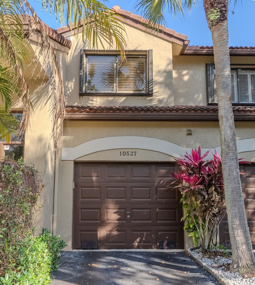 Beautifully maintained and move-in ready coach home featuring a 1-car garage and a spacious, open layout in the desirable Bridgwater community. The renovated kitchen showcases granite countertops, stainless steel appliances, and newer cabinetry—perfect for both everyday living and entertaining. Enjoy tile flooring throughout the common areas with no carpet for easy maintenance, along with added protection from accordion shutters. This bright and airy unit offers generous living space and serene garden views, creating a peaceful retreat to call home. Residents enjoy access to a community pool and an amenity-rich park featuring tennis courts, pickleball courts, basketball and volleyball courts, a playground, and a scenic walking path. A perfect blend of comfort, convenience, and lifestyle!