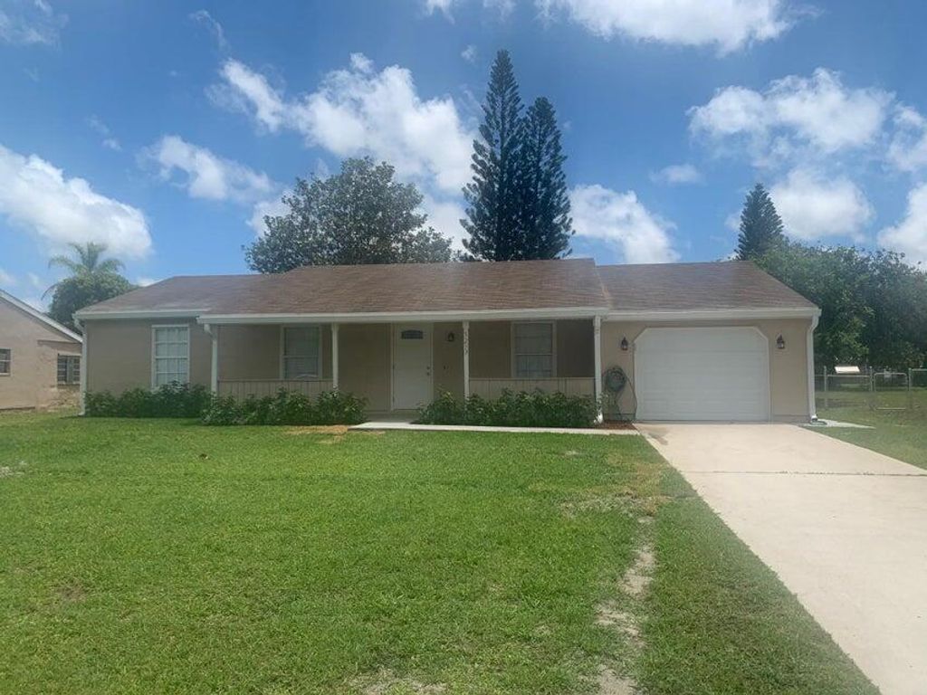 Photo of 3253 SW Ronlea Court, Port Saint Lucie, FL 34953 (MLS # R10987829)