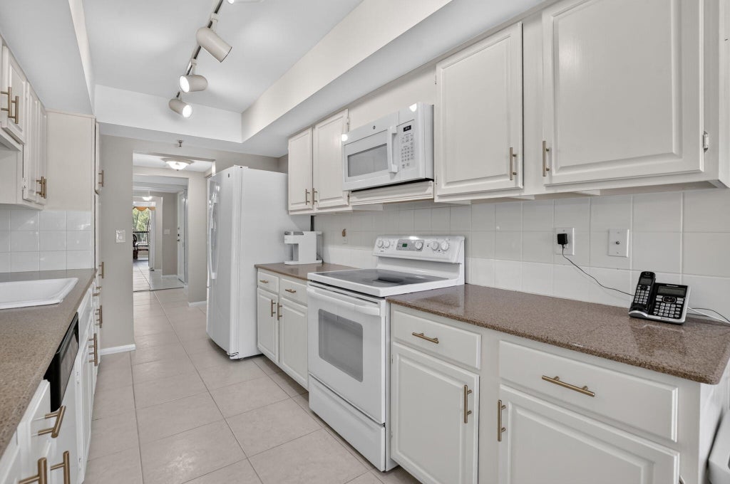 Photo of 20110 Boca West Drive #228, Boca Raton, FL 33434 (MLS # B26069590)