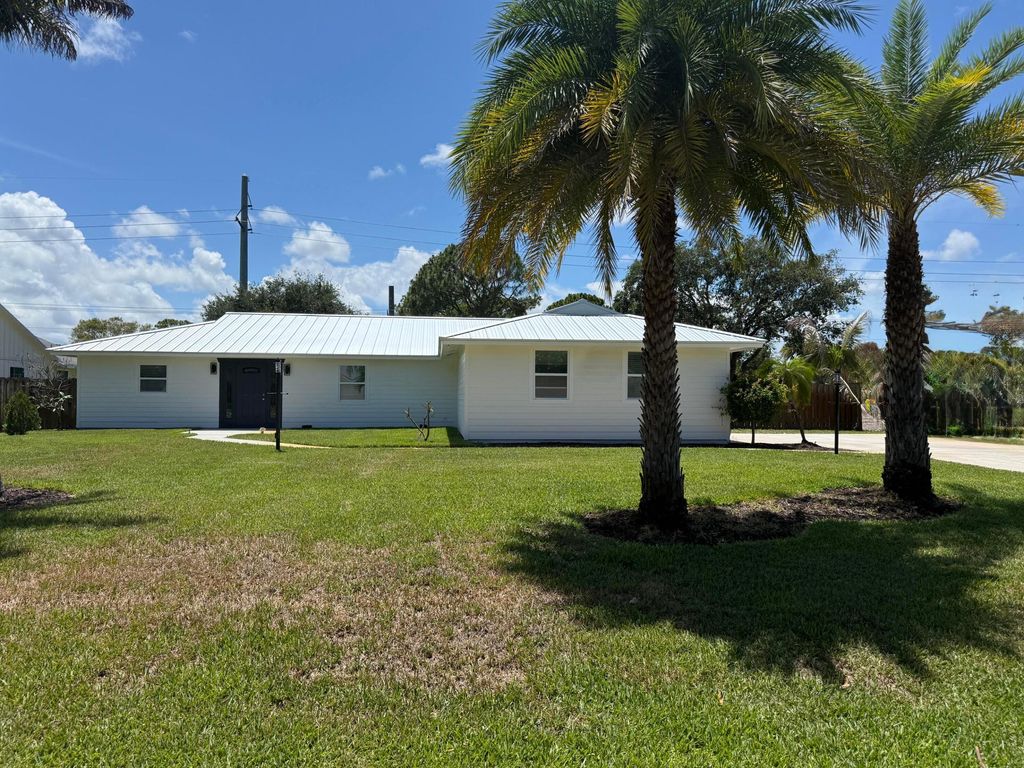 Photo of 5883 Set-n-sun Place, Jupiter, FL 33458 (MLS # B26031930)