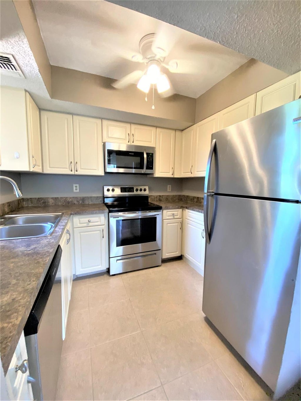 Photo of 1556 SE Royal Green Circle #104, Port St Lucie, FL 34952 (MLS # R10908384)