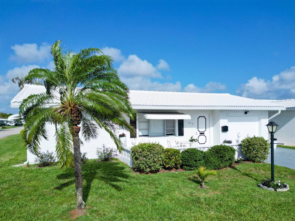 Photo of 1317 SW 18th Street, Boynton Beach, FL 33426 (MLS # R11077474)