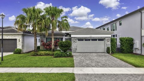 Photo of 8544 Apple Falls Lane, Boca Raton, FL 33496 (MLS # B26041332)