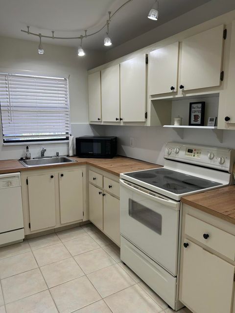 Tiny photo for 4700 Lucerne Lakes Boulevard #308, Lake Worth, FL 33467 (MLS # R11169839)