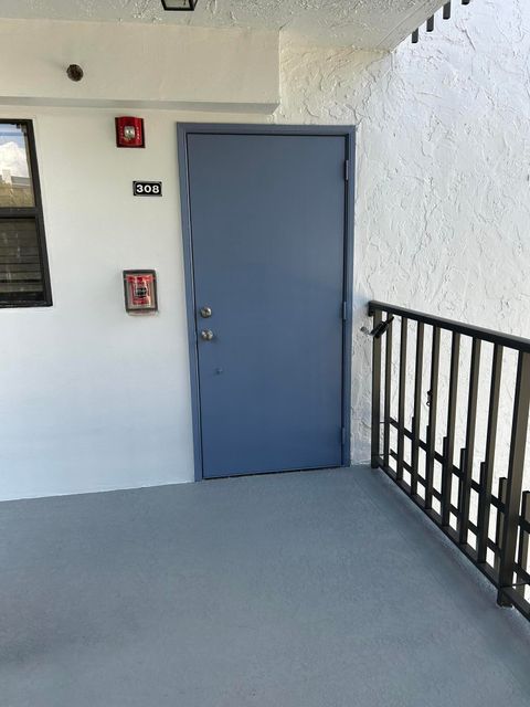 Photo of 4700 Lucerne Lakes Boulevard #308, Lake Worth, FL 33467 (MLS # R11169839)