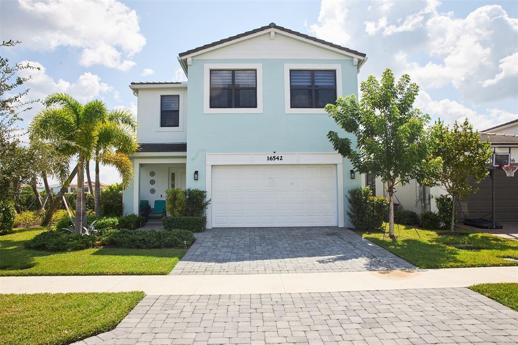 Welcome to Sky Cove South located in WestLake Florida. This Beautiful Home comes with Four Bedrooms, Two Full bathrooms, one half bathroom,including Impact Doors and Windows. In addition to the fixtures, there are full stainless steel appliances with room to upgrade for a family to enjoy for years to come. It's a must see home in a very nice community with a very competitively priced HOA. Agents, bring your buyer to view because this gem will not be on the market for long.