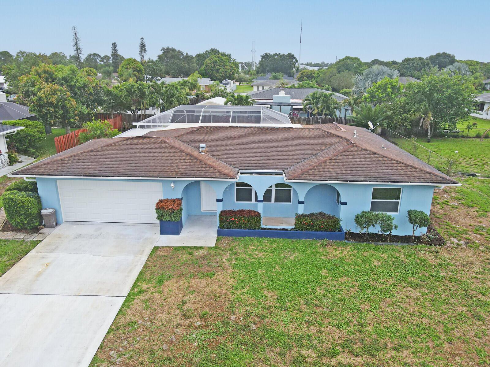 Welcome to your beautifully remodeled 3-bedroom, 2-bath pool home nestled in a quiet, friendly community! This stunning residence offers the perfect blend of style, comfort, and functionality with a bright, open layout and luxury vinyl flooring throughout. The heart of the home is a brand-new kitchen featuring modern finishes and sleek cabinetry, while both bathrooms have been fully updated with contemporary touches.Step outside to your own private oasis -- a screened-in pool and fenced backyard ideal for relaxing, entertaining, or enjoying sunny Florida days in total privacy. The home is flooded with natural light, enhanced by abundant recessed lighting and ceiling fans in every room for year-round comfort. A spacious 2-car garage adds convenience and extra storage.