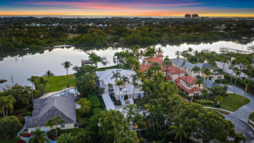 Exquisite Direct Intracoastal Estate! Palm Beach elegance located just north of Donald Ross Road with 98' of waterfront, an eastern rear exposure overlooking the intracoastal waterway and a private preserve on the opposite side of the waterway, this is a very unique opportunity for a custom waterfront estate in Palm Beach County.  Designed and built by the current owner, this home has very specific and detailed finishes from the layout and design to the imported tiles and materials - no detail has been overlooked!  Situated on over 2/3 of an acre with a deeded dock, boat and jet ski lifts, a spacious yard on a quiet cul de sac, and one that should not be overlooked if one is searching for the slice of south Florida paradise.  Dual master baths, guest house...this home truly has it all!
