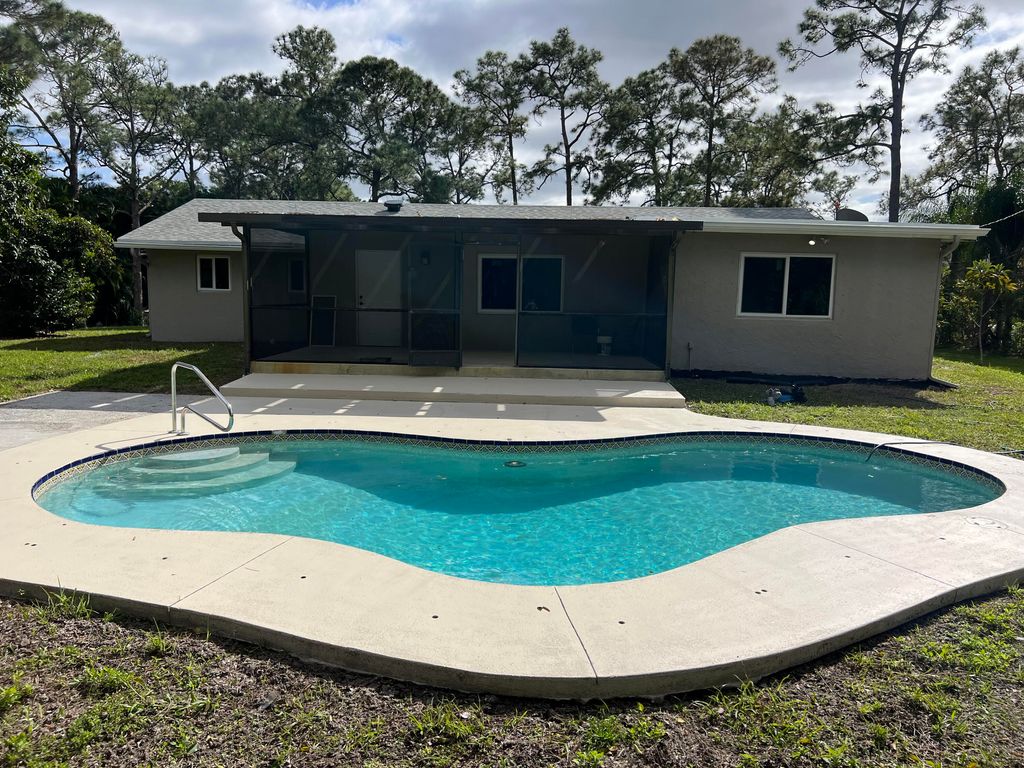 Photo of 11681 Persimmon Boulevard, Royal Palm Beach, FL 33411 (MLS # R10957327)