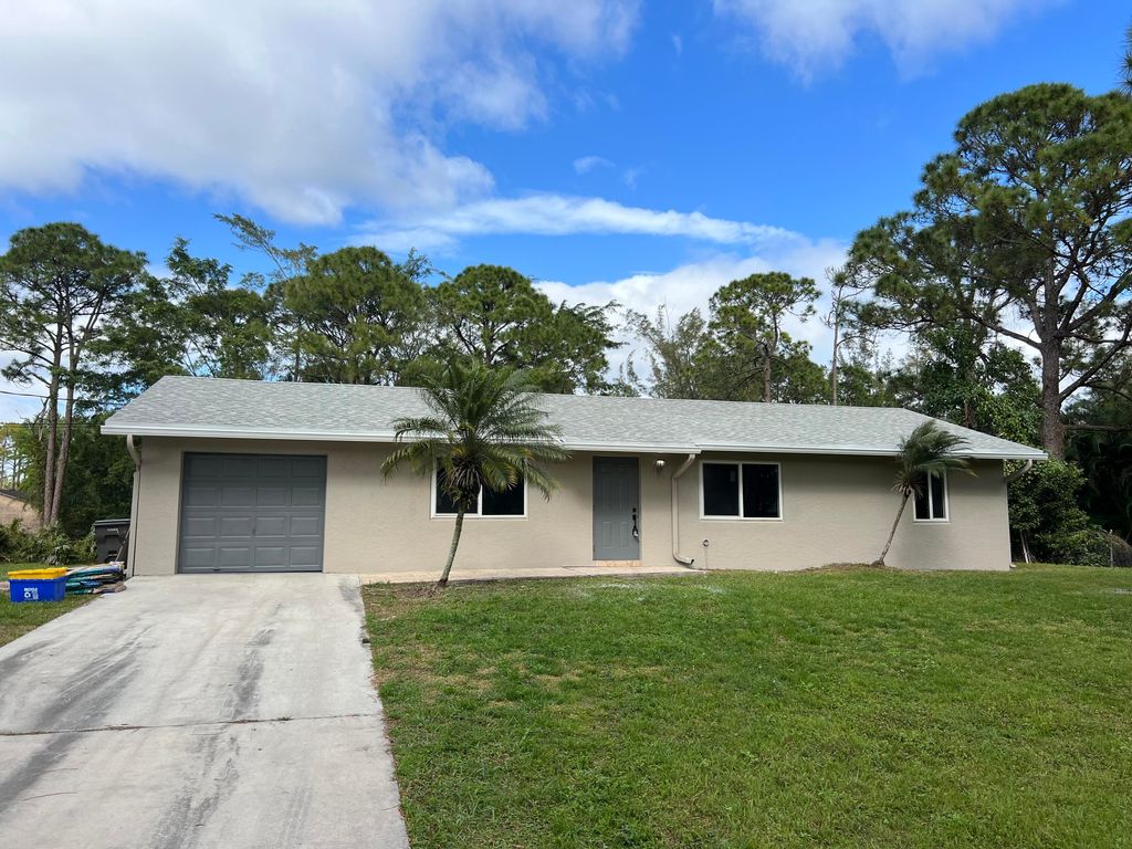 Photo of 11681 Persimmon Boulevard, Royal Palm Beach, FL 33411 (MLS # R10957327)