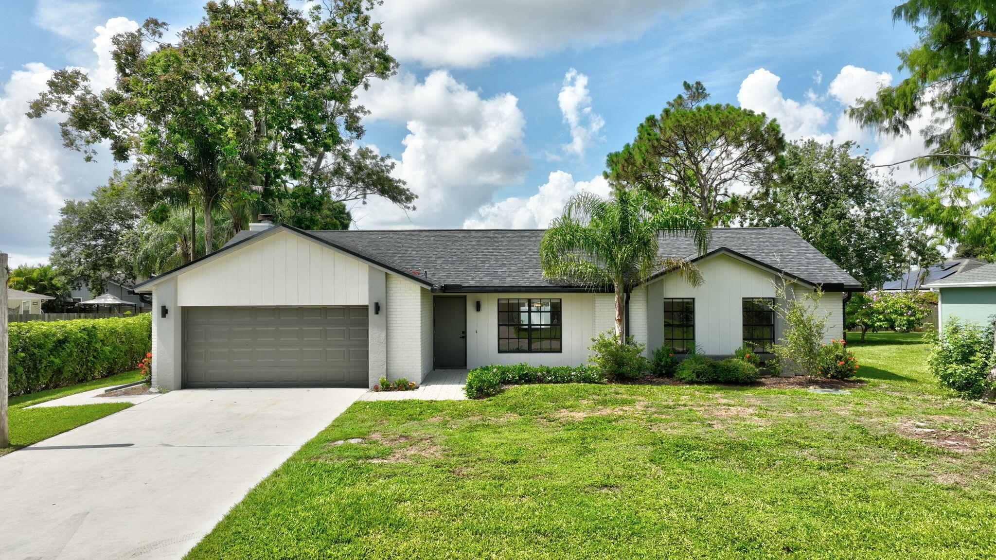 BEAUTIFULLY RENOVATED 3BD/2BA POOL home in the highly desirable Canal Pointe area! This open floor plan is ideal for entertaining, featuring two spacious living areas, a cozy wood-burning fireplace, and a stunning modern kitchen with quartz countertops and stainless steel appliances. Enjoy updated bathrooms, new ceramic tile flooring throughout, and major 2023 upgrades including a new roof, gutters, vinyl fencing, HVAC, water heater, and washer/dryer. Relax on the screened patio or take a dip in the newly refinished pool complete with a new filter system. Large and private backyard surrounded by mature eucalyptus, cypress, palm, and pine trees. 2-car garage. NO HOA! Walk to Canal Park boat launch.