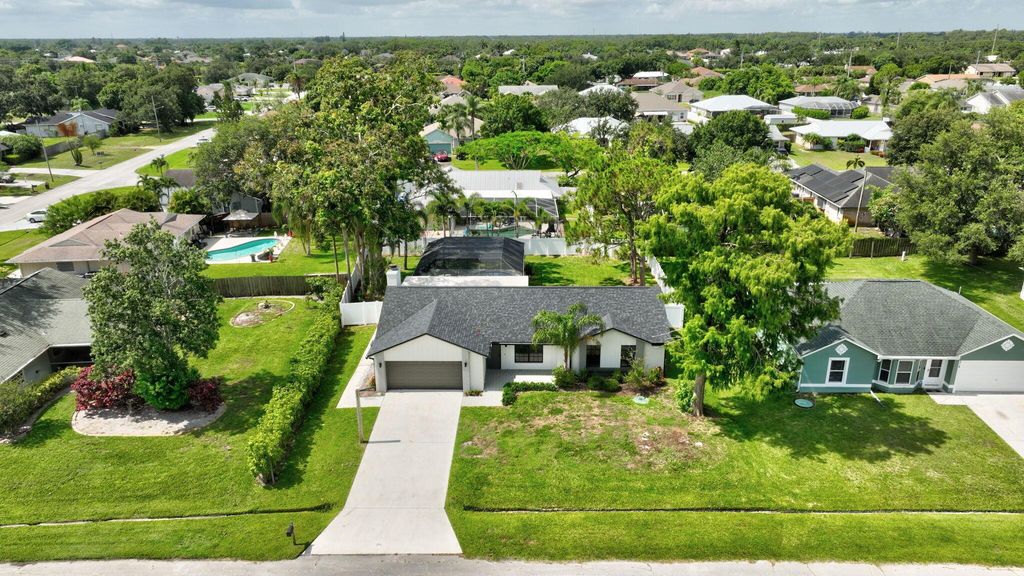 Photo of 208 SW Langfield Avenue, Port Saint Lucie, FL 34984 (MLS # R11100392)