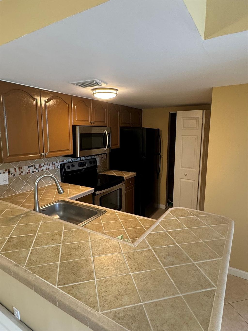 Photo of 10757 Cleary Boulevard #108, Plantation, FL 33324 (MLS # B26016256)