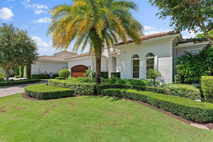 This beautiful Carlisle Model home is situated on a private preserve in the sought after Old Palm Golf Club. Meticulously maintained, 2015 built & interiors designed by renowned builder, Paul Courchene w/top of the line Thermador appliances, gourmet kitchen, butlers pantry, customized millwork and marble flooring throughout. Professionally furnished, ready to move in!  Generous owner's suite w/his/her closets & water closets. The covered lanai overlooks your own lushly landscaped private oasis w/new completely renovated heated pool & spa by Top Notch. 3 ensuite guest rooms. Indoor natural gas fireplace, wet bar, outdoor summer kitchen, electric blinds. 2 car garage & golf cart garage. 24 security. Close to the best of everything the Palm Beaches has to offer. This is a must see!