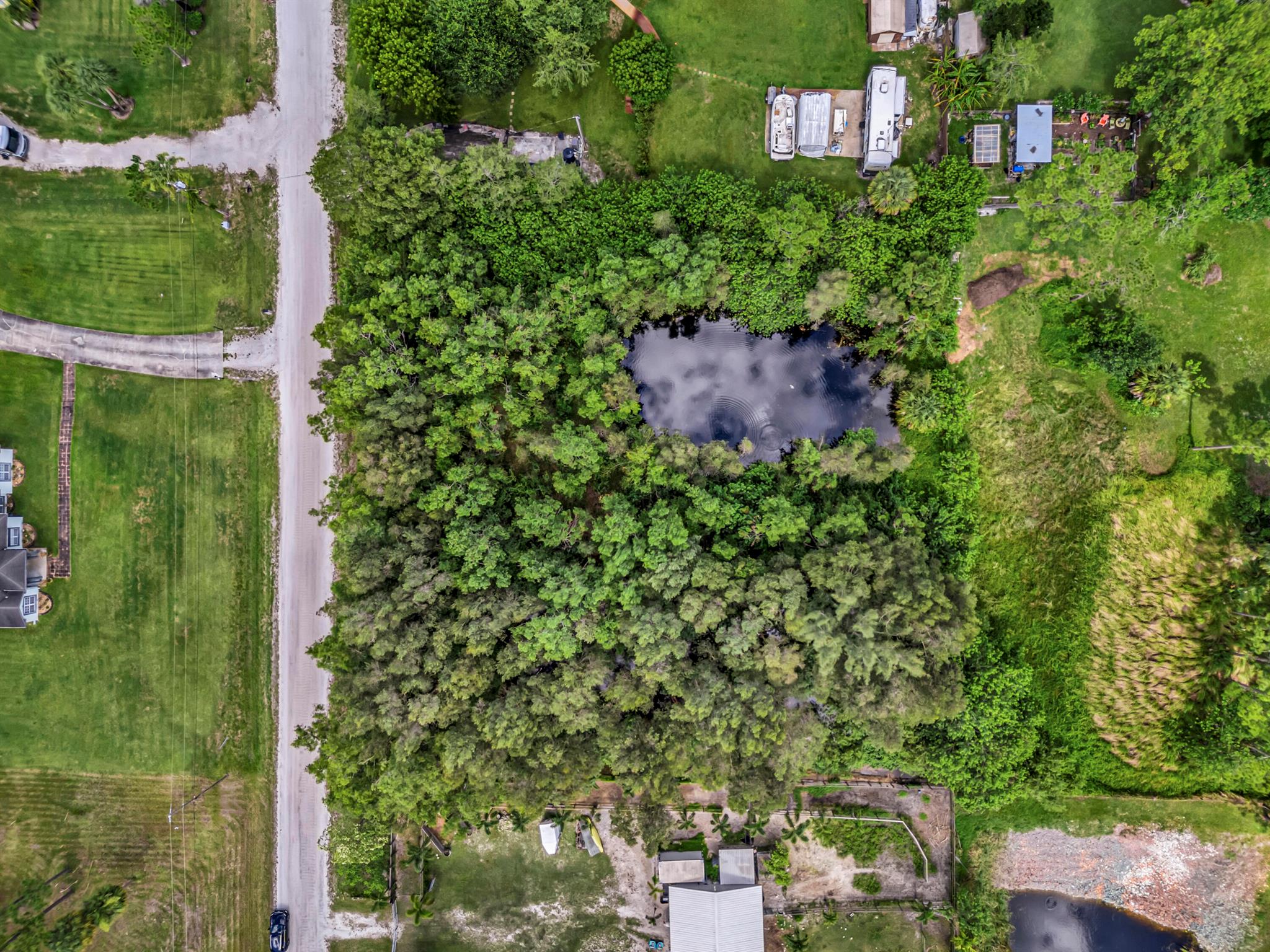 This lot is within 1/2 mile West of the City of Westlake. Just 15 minutes to Wellington. This 1 1/4 acre property is horse friendly, no HOA so bring your toys. Close to shopping and schools. The High School is within walking distance or short ride on the golf cart. Come build your dream home!