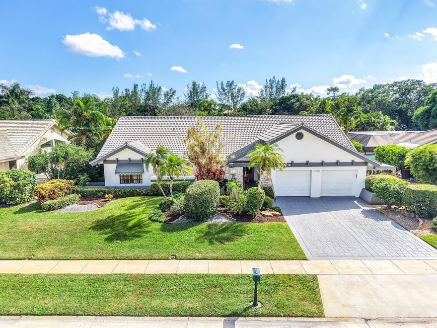 If you're looking for a spacious home in the best location at the right price--this is it! Just 500 feet from the newly renovated Boca Woods Country Club, this 4BR/3BA home offers over 3,096 sqft of living space, high ceilings, and endless potential to make it your dream home. Enjoy total privacy with stunning golf course views and no homes behind you. The oversized screened-in pool and patio are perfect for entertaining or relaxing year-round. Resort-style amenities, golf, tennis, pickleball, and fine dining are just steps away. Don't miss this opportunity!