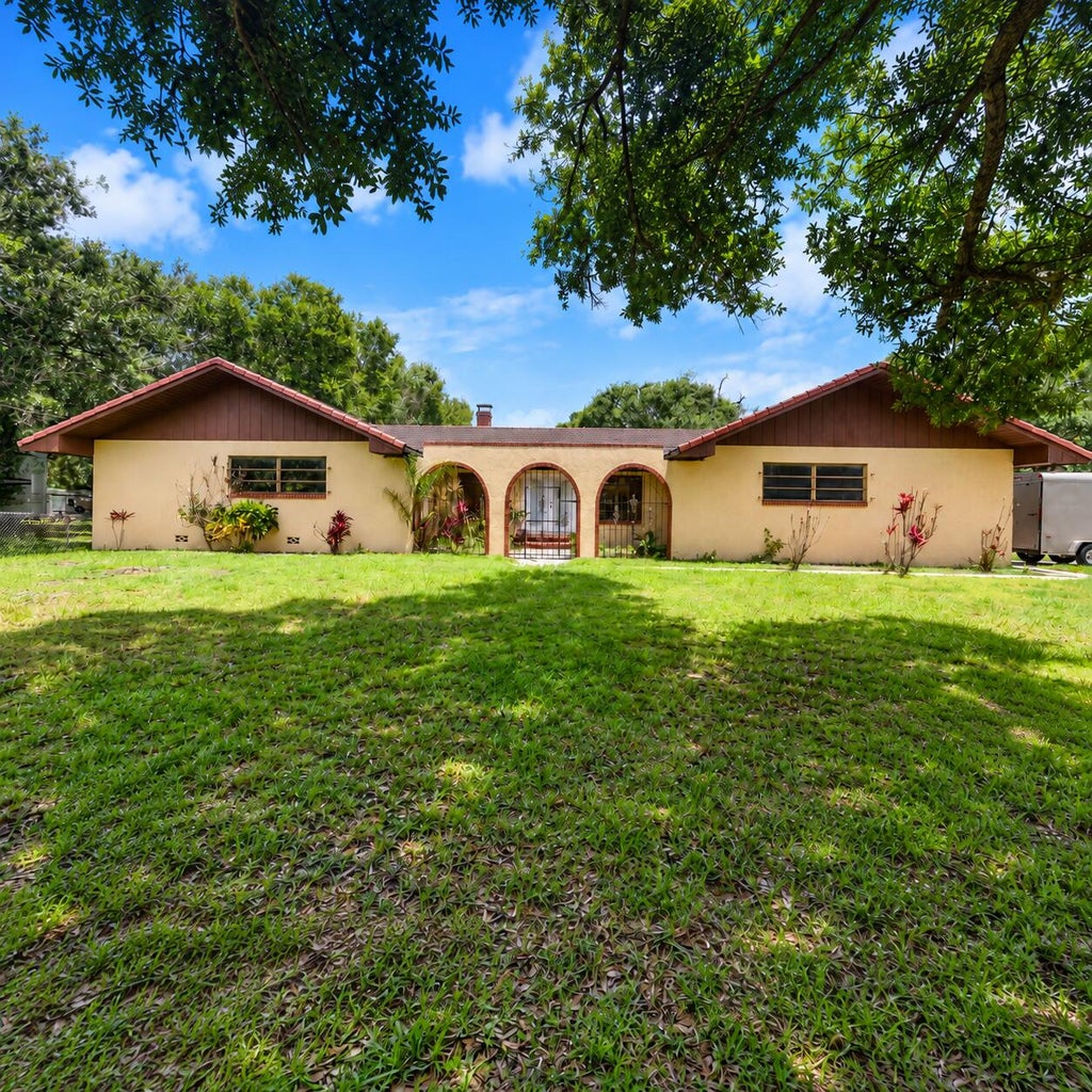Photo of 3150 DAME Road, Fort Pierce, FL 34981 (MLS # B26075417)