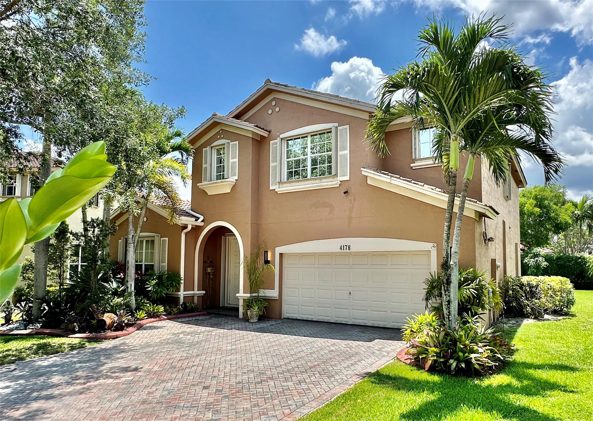 Meticulously Maintained & Updated 5 Bedrooms (1 Downstairs), 4 Full Bathrooms (Including 1 Jack & Jill Bathroom), at the Isles at Weston, Marble Floor Throughout the 1st Floor & Living Area, Hardwood Floor in the 2nd Floor, Contemporary LED lights, Granite Countertop & Stainless Steel Appliance, WiFi Ready, Refrigerator, Dish Washer, Water Heater, & Irrigation System, Updated Guest Bathroom, Accordion Shutters, Large Backyard for Entertainment, Additional Storage in Garage, A-Graded Schools: Cypress Bay High, Falcon Cove Middle, & Manatee Bay Elementary, Property on Cul-de-Sac, Resort Style Community Clubhouse, Swimming Pool, Gym & Playground. Call for a Private Viewing today!